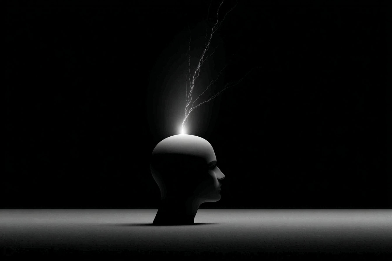 A featureless mannequin head in profile with a bolt of lightning striking upward from its crown against black.